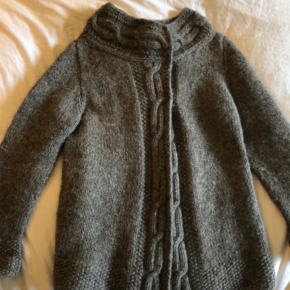 Hand knitted gray wool sweater